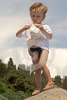 Little boy on a background mountains (3)