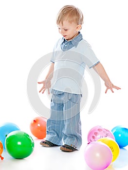 Little boy in balloons