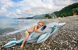 Little boy on beach at the sea