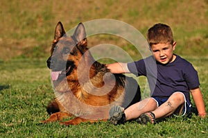 Little Boy With Big Dog