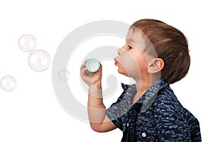 Little boy blow bubbles