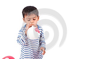 Little boy blow up balloon