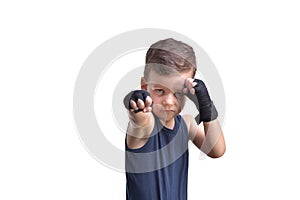 Little boy boxing, shows his fists, isolated on white