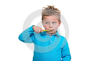 Little Boy Brushing Teeth on white background