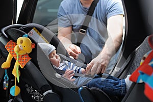 Little boy in car seat