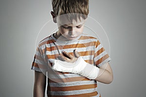 Little boy in a cast.child with a broken arm.kid after accident