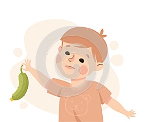 Little Boy Character Showing Dislike and Disgust Holding Cucumber Vector Illustration