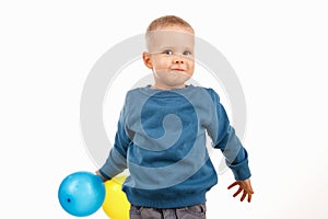 Little boy child holding balloons, happy childhood. soft focus