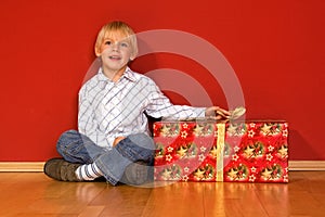 Little boy with christmas gifts