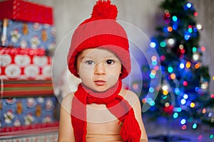 Little boy on christmas, opening presents