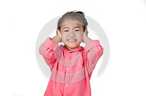 Little boy closing ears with his hands, isolated.