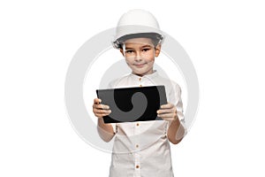 little boy in construction helmet with tablet pc