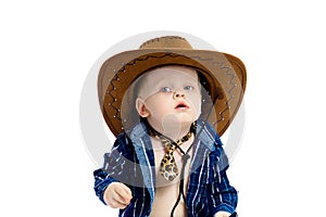 Little boy in cowboy hat and tie