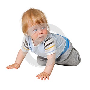 Little boy crawling on white