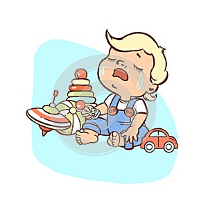 Little boy crying, sobbing, very upset, toy cubes, toy car