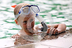 Little boy with diving glasses and schnorkel