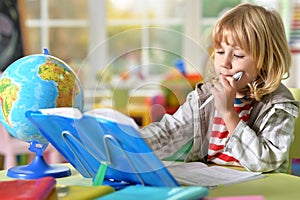 Little boy doing homework