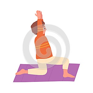 Little boy doing yoga exercise