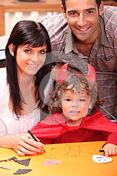 Little boy dressed in devil