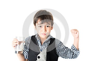 Little boy drinking fresh milk for healthy background of UHT milk storage