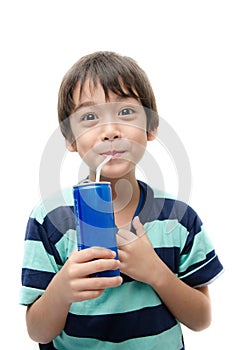 Little boy drinking soft drink can on white background