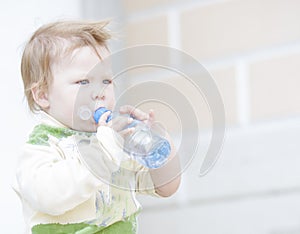 Little boy drinking water