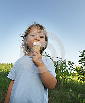 little boy eating an ice cream