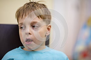 Little boy eating at the table