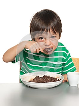 Little boy has his breakfast