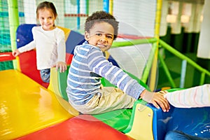 Little Boy Enjoying Slides