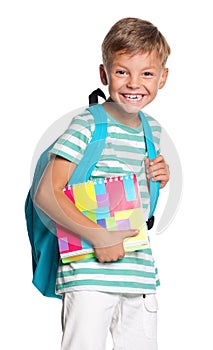 Little boy with exercise books