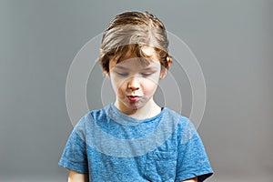 Little Boy Expressions - Rascal got caught photo