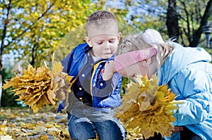 Little boy fascinated by crawling insect