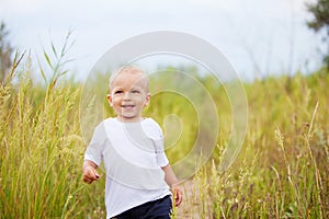 Little boy in the field