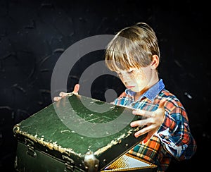 Little boy finding treasure