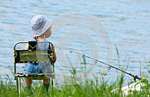 Little boy with fishing rod