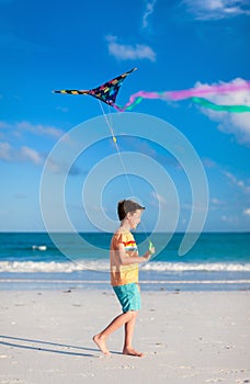 Little boy flying a kite