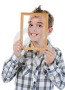 Little boy with a frame in his hands