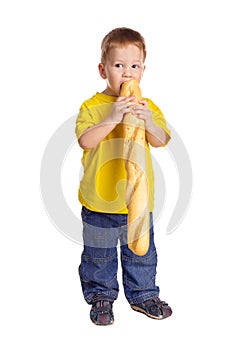 Little boy with french baguette