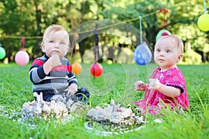 Little boy and girl eating