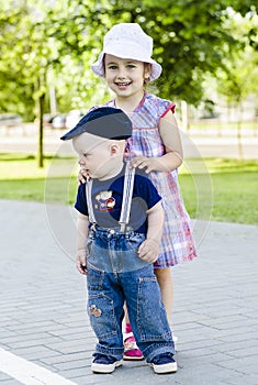 Little boy and girl hugging