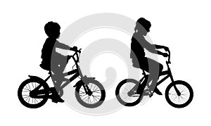 Little boy and girl riding bicycle vector silhouette illustration isolated on white background. Brother and sister enjoying.