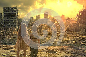 Little boy and girl, sad alone children, ruined house, destroyed city street post apocalyptic scene.