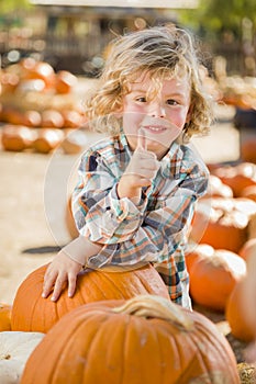 Little Boy Gives Thumbs Up at Pumpkin Patch