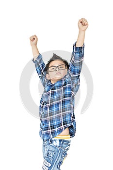Little boy in glasses raise hands up on white background