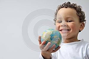 Little boy with globe