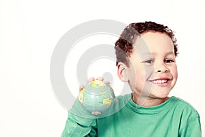 Little boy with globe in his hand with white background stock photo