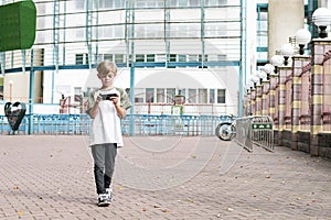 The little boy on the go with your phone