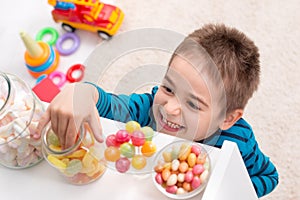 Little boy has discovered candy