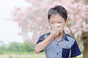 Little boy has running nose from allergies